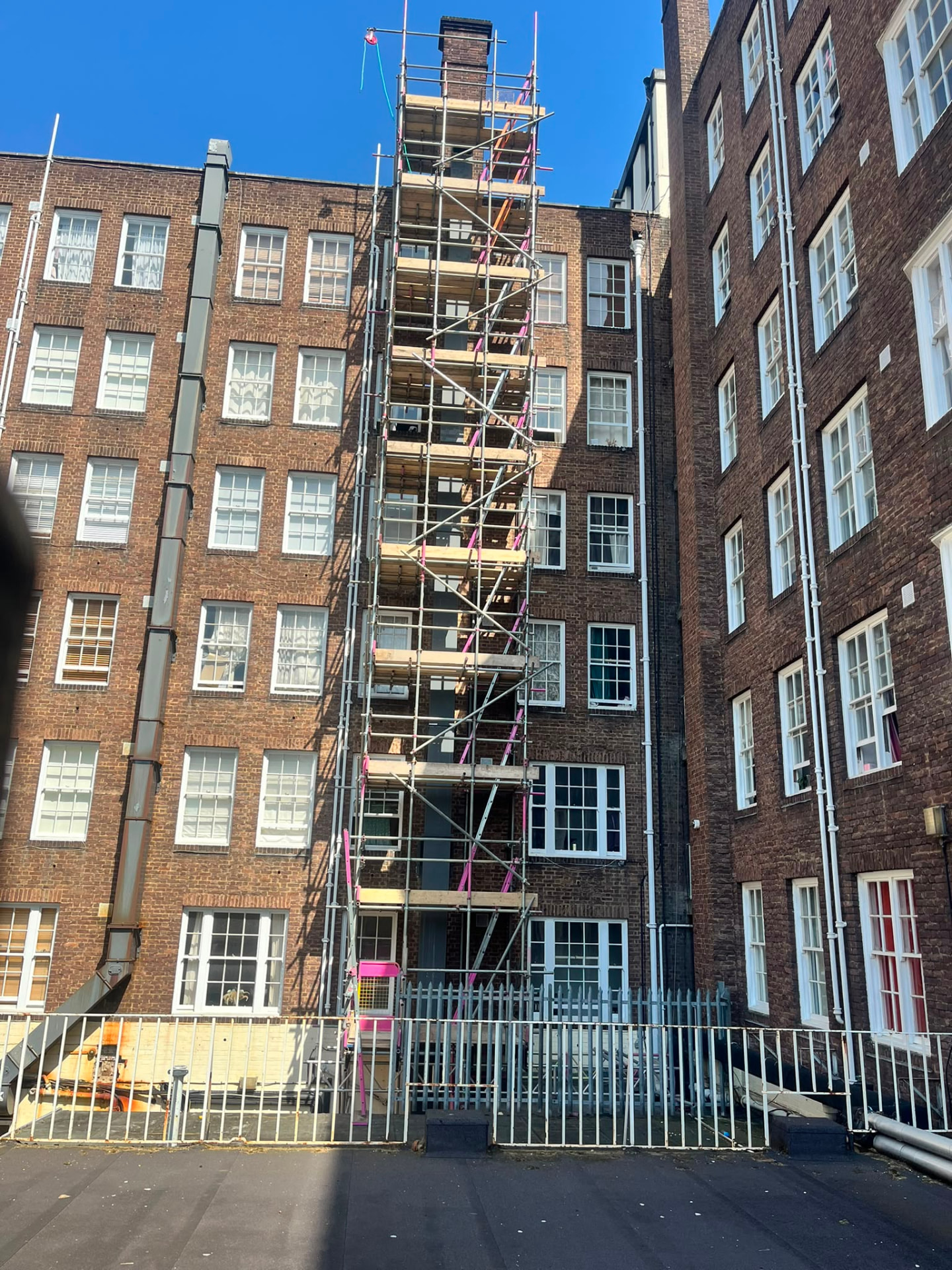 Full height scaffold alongside the new ducting riser at Queensway, London - Pinnacle Scaffolding