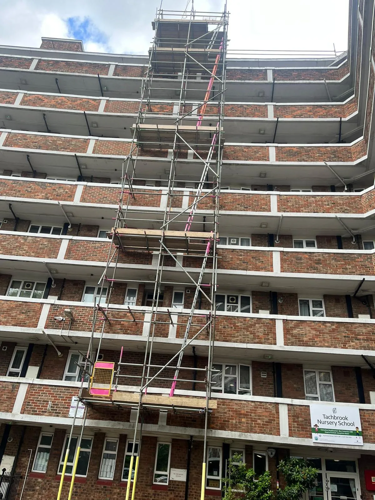 High-rise access scaffold on residential tower block for solar installation